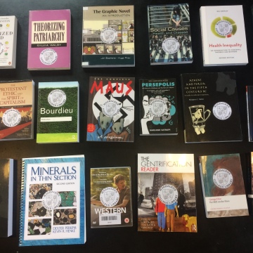A photograph of some of the new books purchased Summer 2019.
